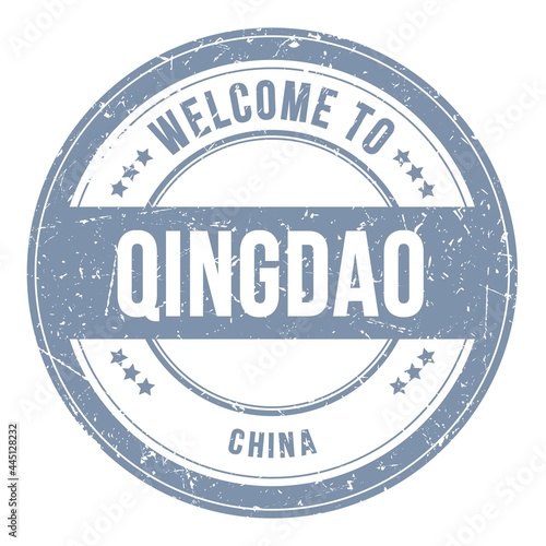 WELCOME TO QINGDAO - CHINA, words written on gray stamp