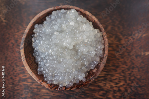 A cup of white wet sago on wooden bowl at home in Dhaka, Bangladesh