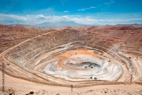 View from above of the pit of an open-pit copper mine in Peru