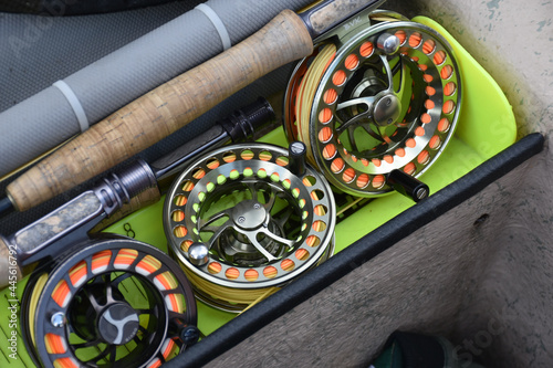 A collection of fly-fishing reels at the ready