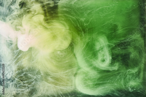 Abstract green color background. Swirling vibrant hookah smoke, underwater emerald ocean, dynamic paint in water