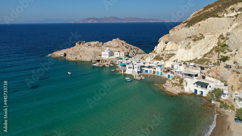 Aerial drone photo of famous traditional fisherman settlement of Firopotamos with colourful boat houses called sirmata, Milos island, Cyclades, Greece