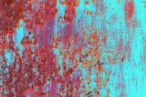 Rusty green painted metal background.