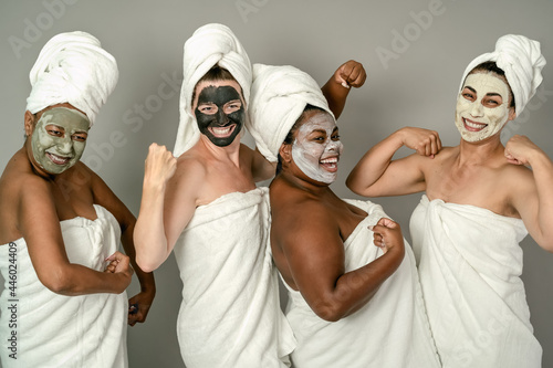 Happy multiracial women having skin care spa day - People selfcare concept