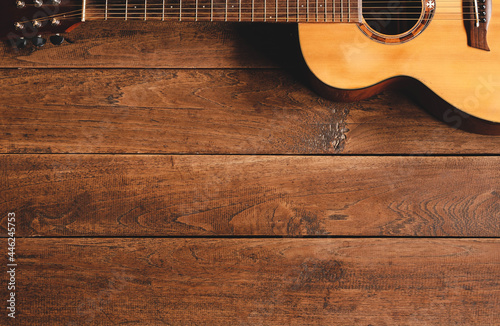 classical guitar on wooden background