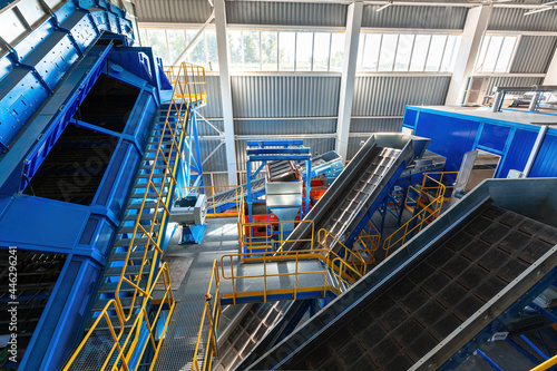 A modern plant for sorting and recycling household waste and waste. Large industrial complex of conveyors, bunkers.