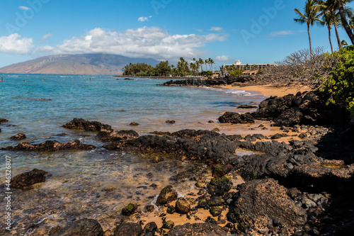 North Maui and Exposed Lava on The Beach at Kamole Beach Park III , Maui, Hawaii, USA