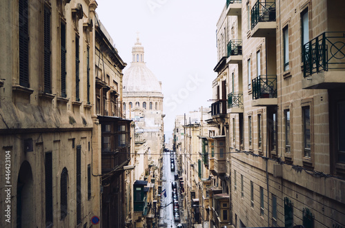MALTA, VALETTA: Scenic cityscape view of the streets with old buildings 