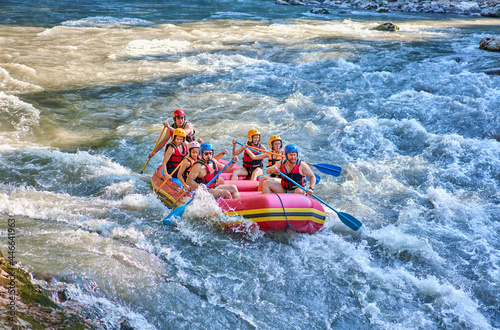 rafting on a stormy mountain river in summer