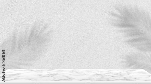 White wall background with shadows of tropical leaves and a countertop for product placement and advertisement. Mock-up layout template with a podium for product showing. Abstract wall background.