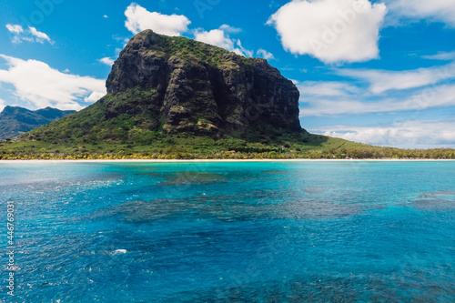 Tropical island with Le Morne mountain, blue ocean and coastline in Mauritius. Aerial view