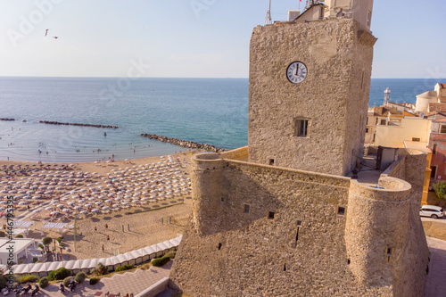 Panoramic aerial view of the beach and the ancient Castello Svevo fortress during a summer day , in the ancient town of Termoli , Molise , Italy