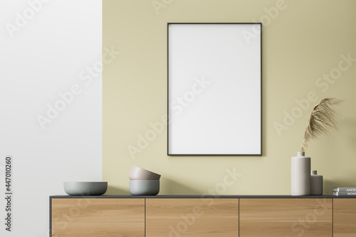 Mock up empty poster on the wall. Modern living room interior. Stylish furniture. Concept of contemporary design.