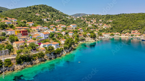 Aerial view of the cliff side of the Kioni village in Ithaca during the pandemic summer of 2020