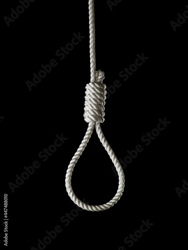 loop of white rope on a black background