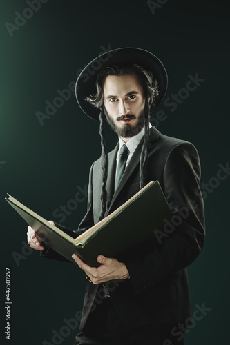 rabbi with big book