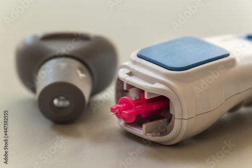 Blood sugar measuring: Close-up of equipment and a lancet to get blood for blood glucose analysis