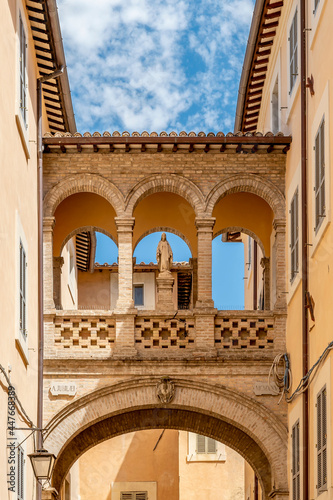 The ancient arch in Via del Seminario in the historic center of Spoleto, Italy 