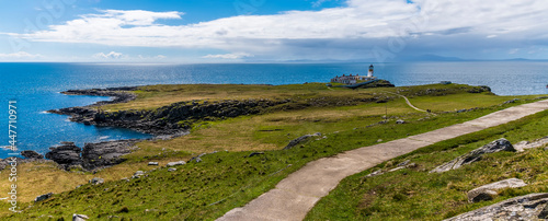 A panorama view towards the lighthouse at Neist Point on the island of Skye, Scotland on a summers day