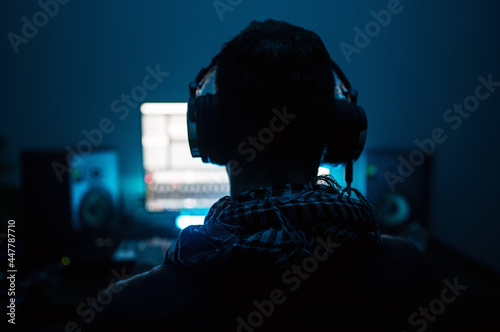 Sound producer working in recording studio.