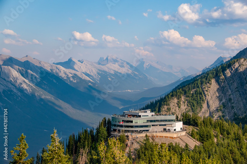 The upscale restaurant Sky Bistro sits at the upper end of the Sulphur Mountain Gondola on top of the mountain in Banff National Park, Alberta with mountains in the distance.