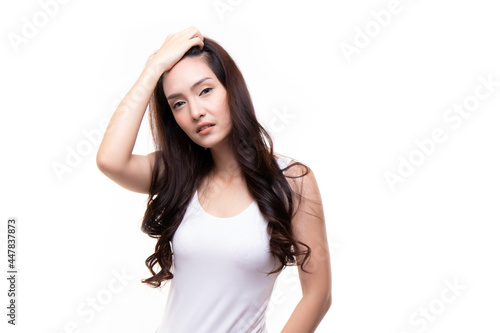 Studio beauty shot concept. Attractive beautiful young asian woman smiling cheerfully with long hair brunette wearing white casual T-shirt standing isolated on white background.