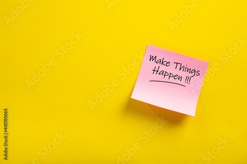 sticky note with make things happen word.