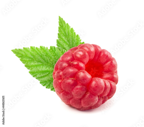 Ripe sweet raspberry with green leaves isolated on white background.