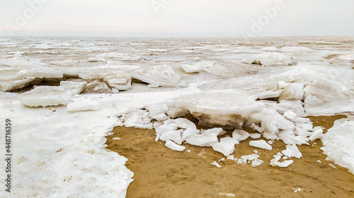Ice hummocks on the sea coast in winter