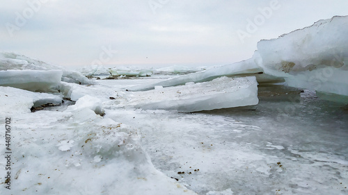 Ice hummocks on the sea coast in winter