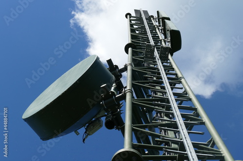 Radio mast and broadcasting for emergency situations in front of blue sky on a high mountain in Styria near Knittelfeld in the Alps of Austria.