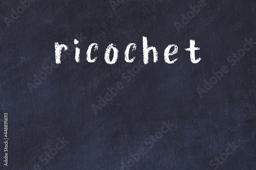 College chalk desk with the word ricochet written on in