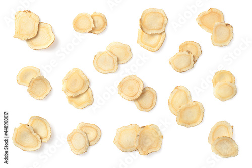 Dried American ginseng slices isolated on white background, top view