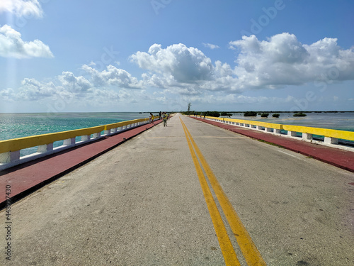 Cayo Coco, Cuba, 16 may 2021: Tourists cross the Hemingway Bridge on foot and admire the sea views. The Hemingway Bridge connects the Cuban islands of Cayo Coco and Cayo Guillermo.