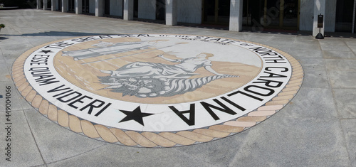 The front entrace of the North Carolina State Legislature building in Raleigh with the state seal and motto - Esse Quam Videri -- To Be, Rather Than To Seem