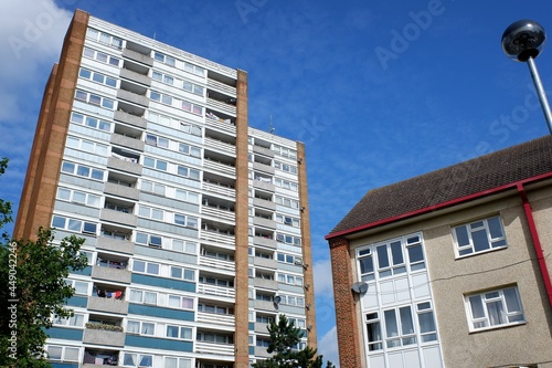 Local authority tower block and apartment building on English council housing estate