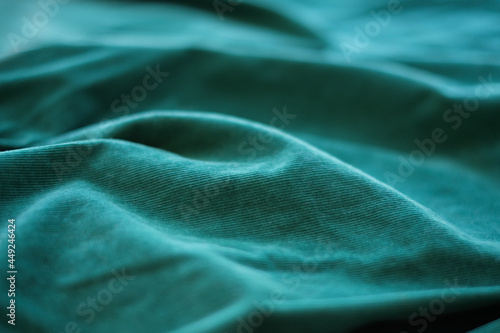 Dark green cotton velvet fabric as background