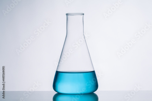 conical flask with blue liquid.