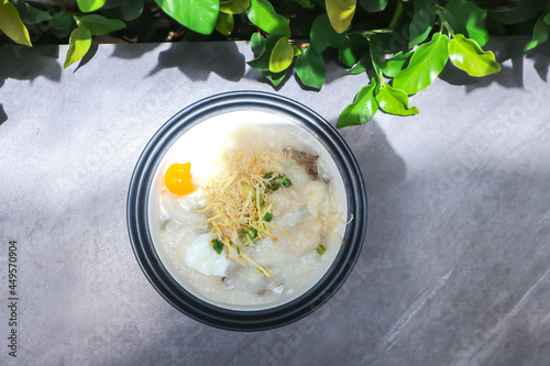 rice gruel or rice porridge or congee with pork , pork ball and egg