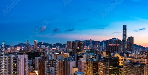 Hong Kong / China - July 2017: Ultra wide image of Hong Kong cityscape at dusk.