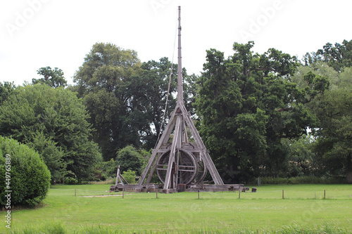 Trebuchet of the Warwick Castle surrounded by greenery in the daylight in the UK