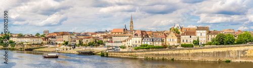 Panoramic view at the Bergerac town from bridge over Dordogne river - France