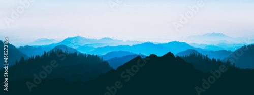 Blue landscape background banner panorama illustration -.Breathtaking view with black silhouette of mountains, hills and forest