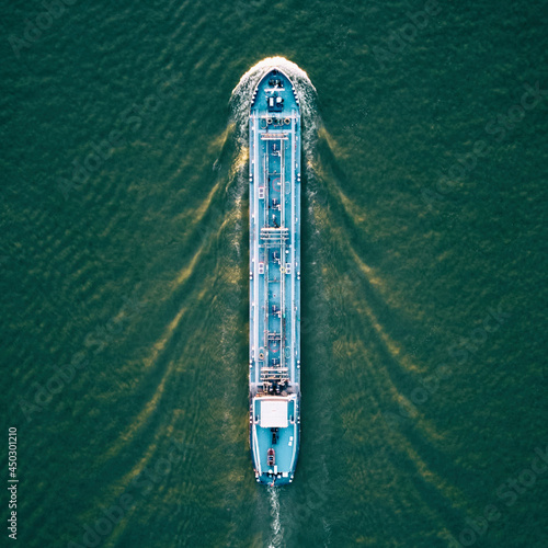Tankship industrial gas carrier seen from a drone view.