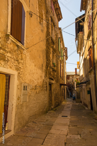 A residential road in the historic medieval hill village of Buje in Istria, Croatia 