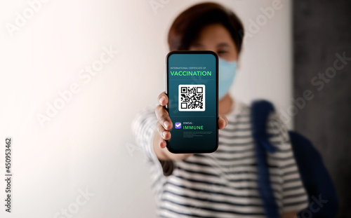 Back to School Concept. Health Vaccine Passport for Coronavirus or Covid-19. Student Presenting Mobile Phone Screen with Vaccination in Immune Status to Certificated in College