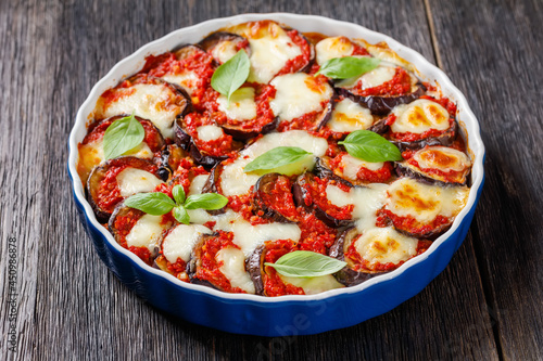 eggplant parmigiana in a baking dish, top view