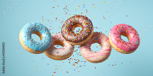Flying Frosted sprinkled donuts. Set of multicolored doughnuts with sprinkles isolate on color background. 3d rendering.