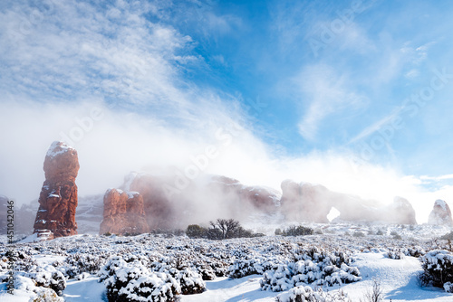 Winter fog clearing at Arches National Park