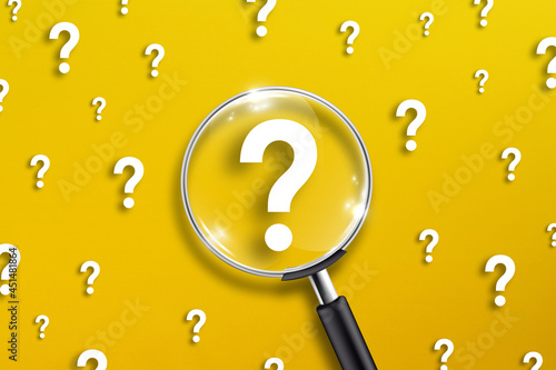 Magnifying glass and question mark on yellow background
